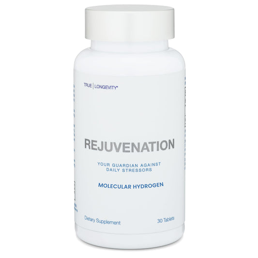 Glass of water with a DRINK HRW Rejuvenation tablet dissolving showing a cloudy swirl