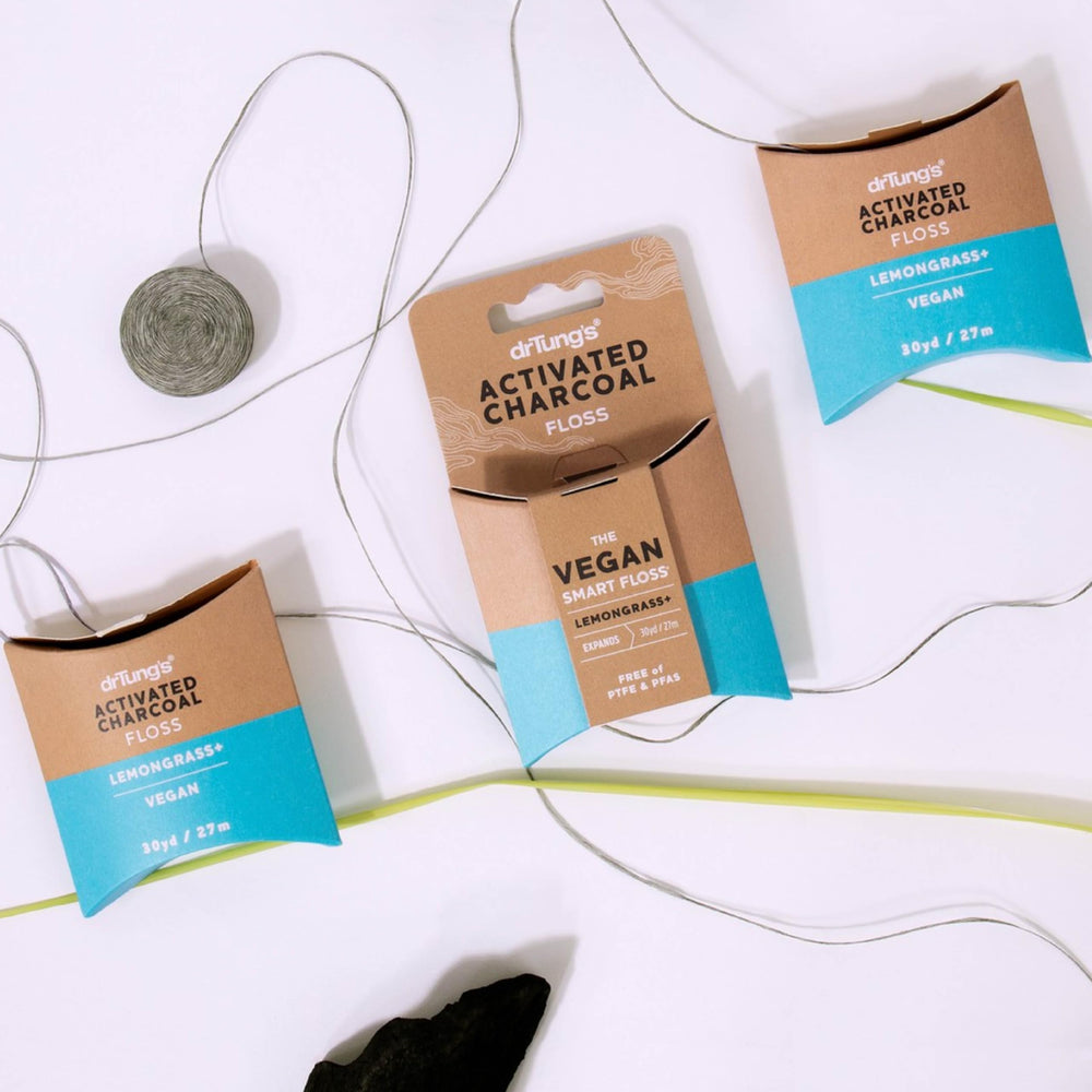 DrTung's charcoal floss in use showing flossing technique