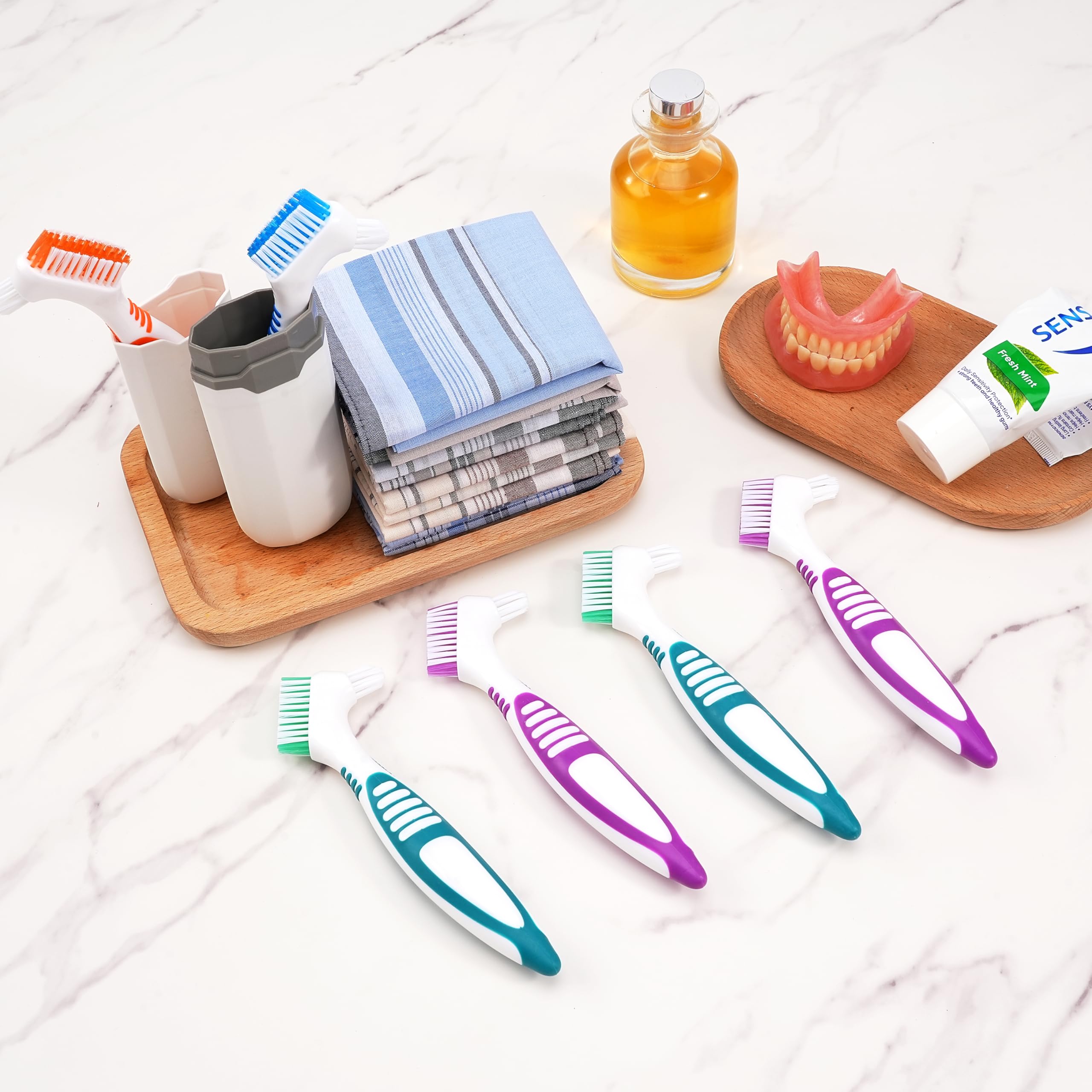 Dual-headed denture brush for dentures with large and small heads