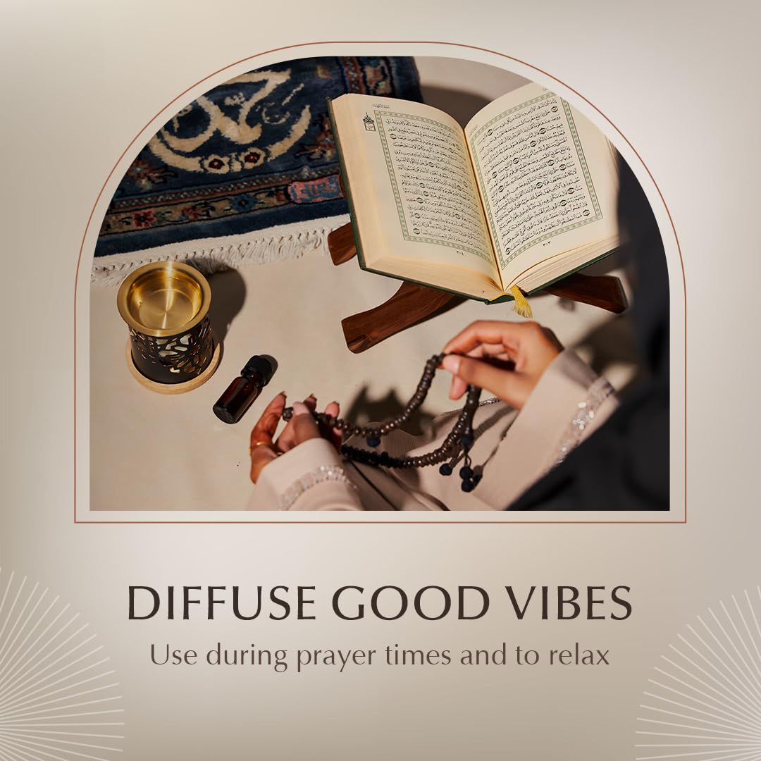 Dukhni oud oil drops in diffuser bowl for aroma.