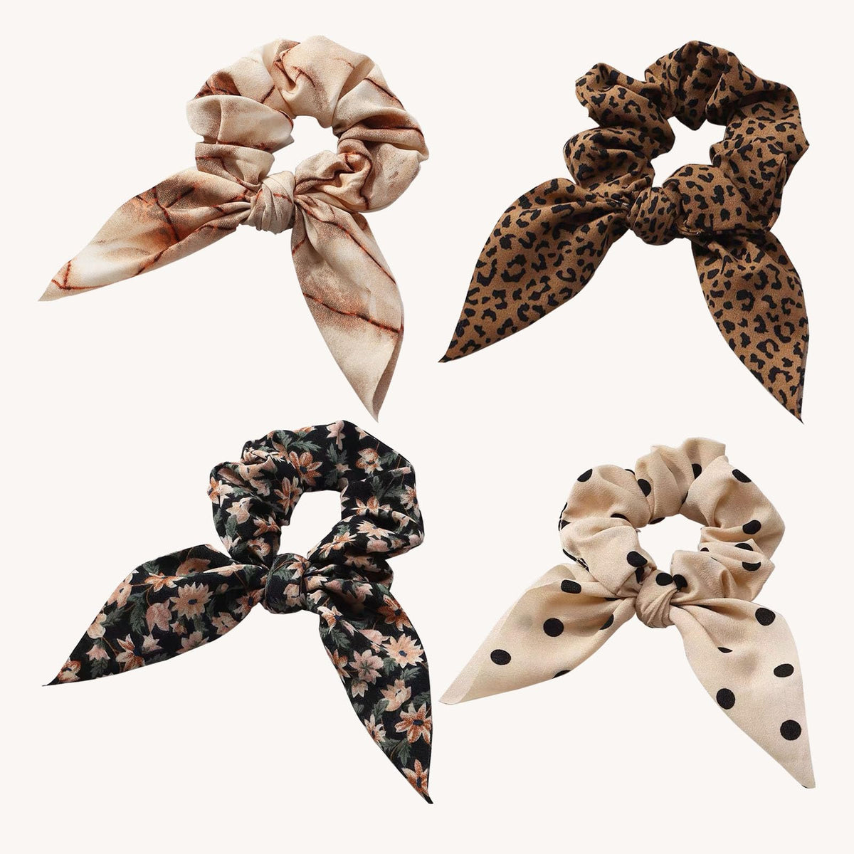 E7E1 leopard scarf scrunchie brown closeup highlights soft chiffon and bow for versatile looks.