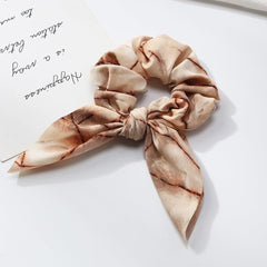 E7E1 stretchy-elastic-band grips hair securely without damage.