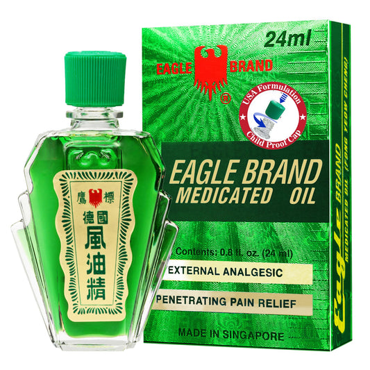 Close-up of Eagle Brand medicated oil bottles
