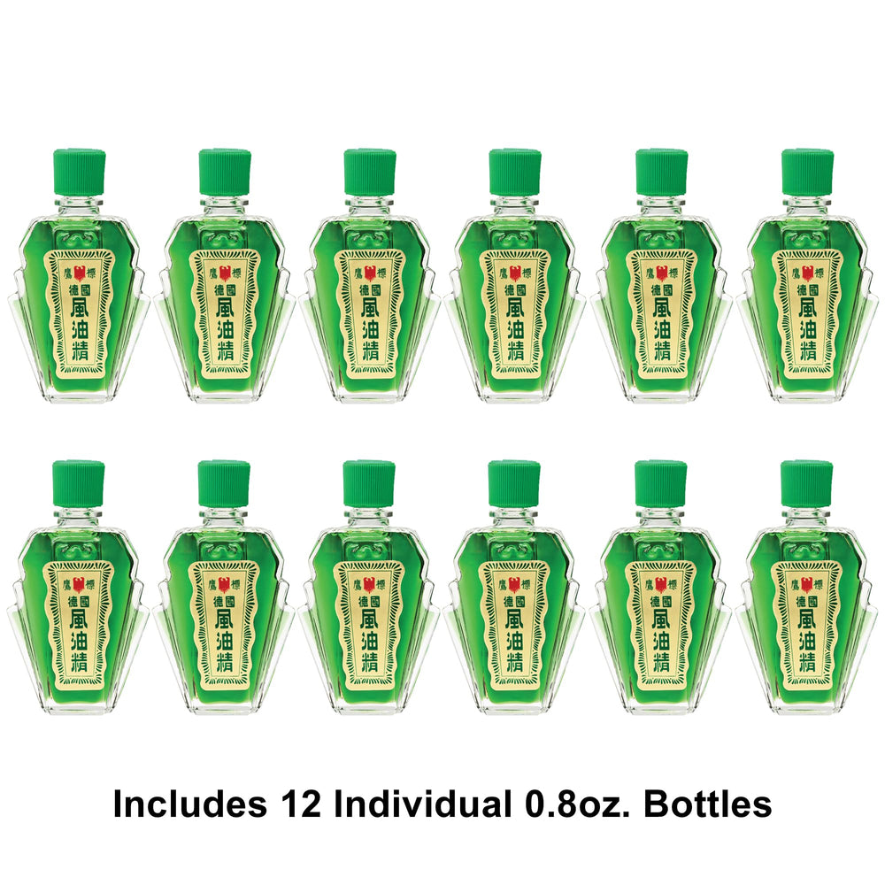 Bottle of Eagle Brand natural medicated oil with green color
