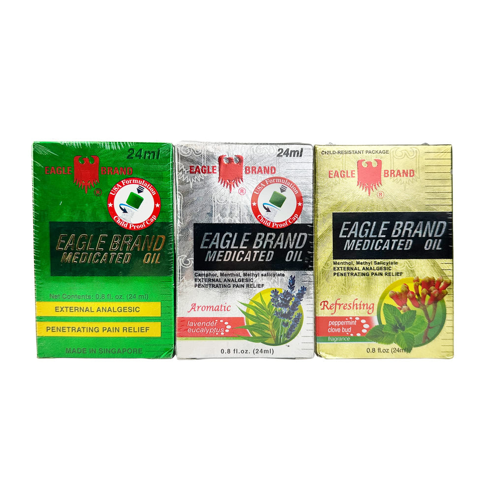 Three Eagle Brand medicated oil bottles in green, gold and clear colors (0.8 oz each) from the variety pack.