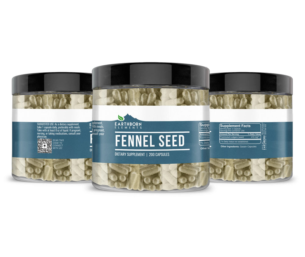 Capsules arranged with fennel leaves as background