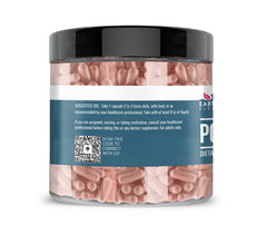 Pomegranate fruit and capsules arranged for Earthborn Elements
