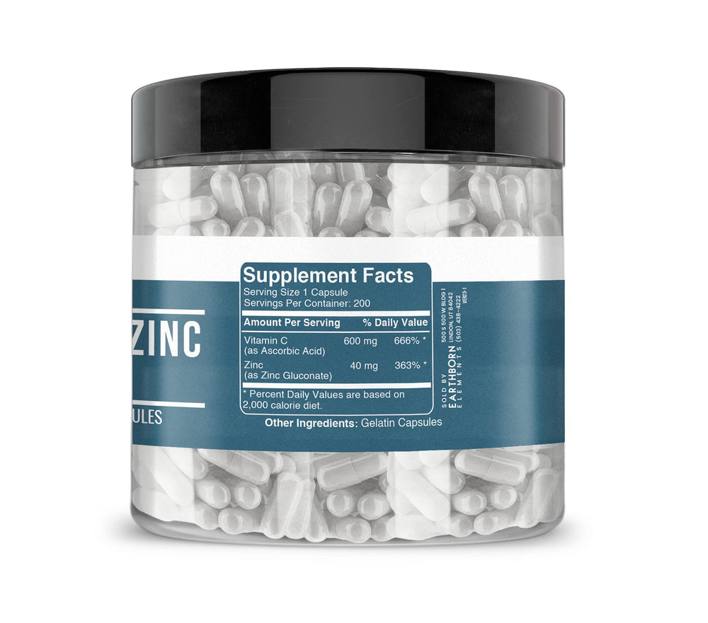 Earthborn Elements Vitamin C + Zinc Gluconate capsules close-up on white background