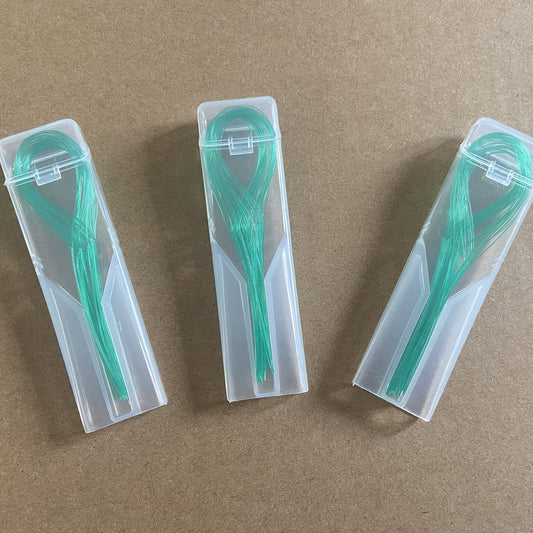 Close-up of nylon loop threading design on floss threader