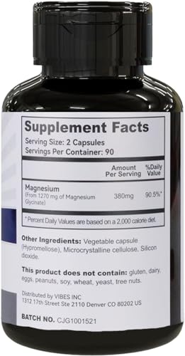 Close-up of magnesium glycinate capsules inside bottle