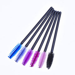 EBOOT mascara wand lavender head for accurate placement and lift.