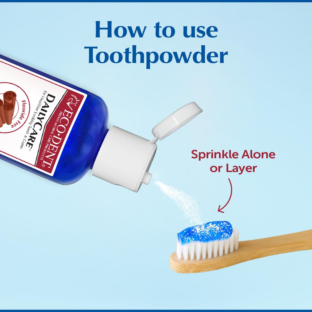 Essential oils bottle beside toothpowder jar