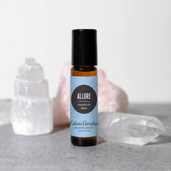 Close-up of Allure roll-on applicator and cap