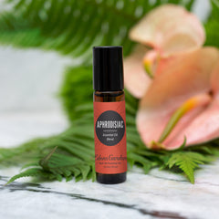 Close-up of Aphrodisiac roll-on applicator with oil