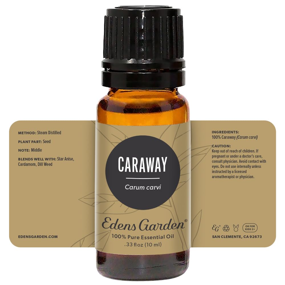 Close-up of Edens Garden Caraway essential oil bottle