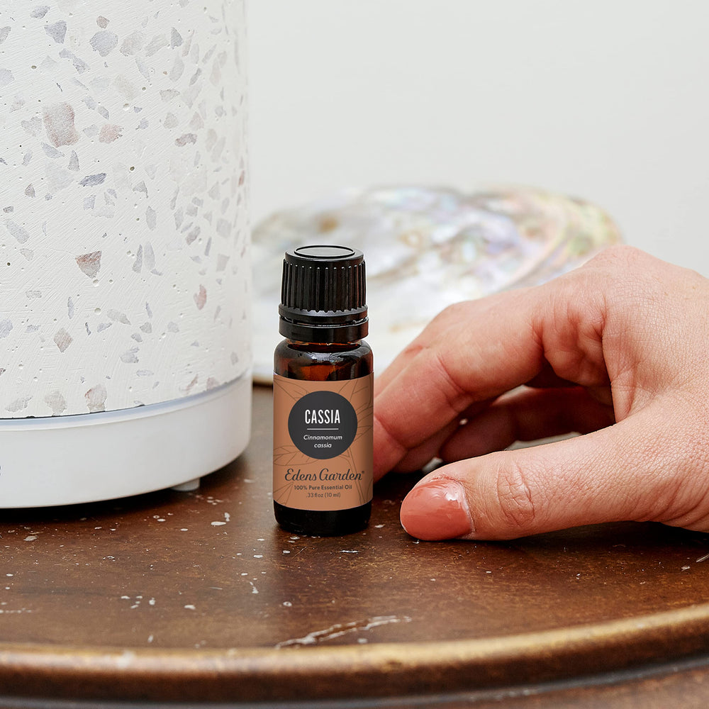Close-up of Cassia essential oil dropper bottle