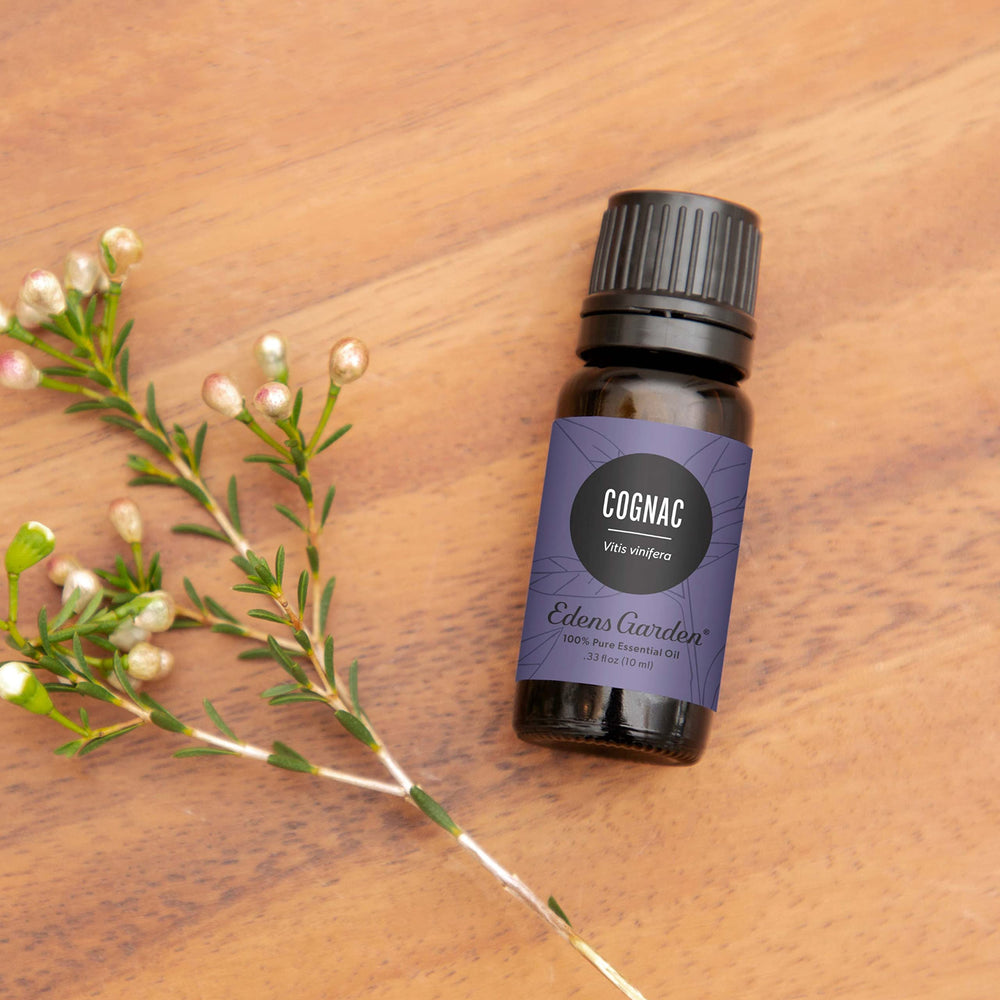 Close-up of Cognac Essential Oil dropper and bottle
