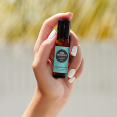 Close-up of Edens Garden essential oil blend bottle label