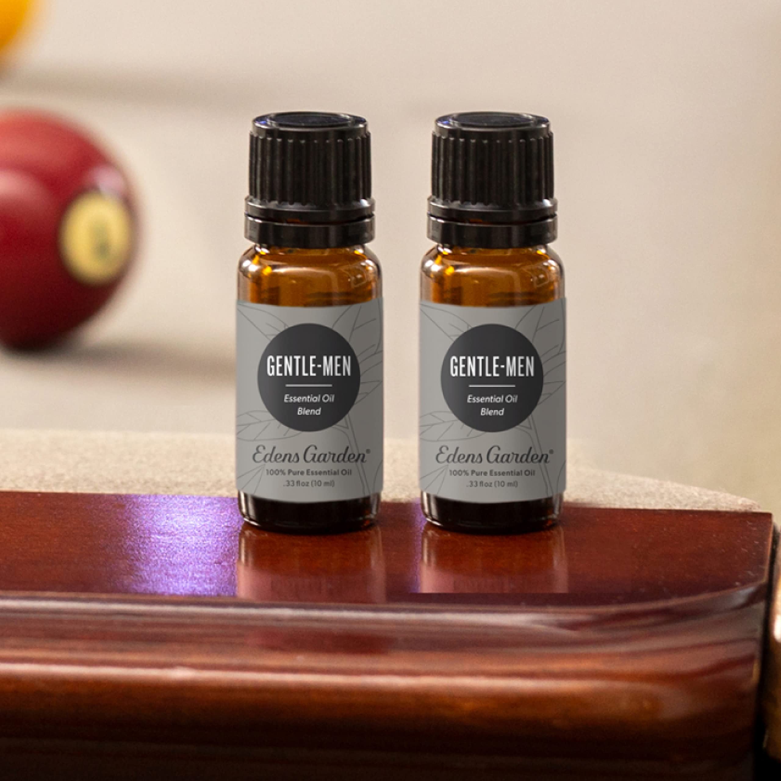 Close-up of Edens Garden Gentle-Men Essential Oil bottle