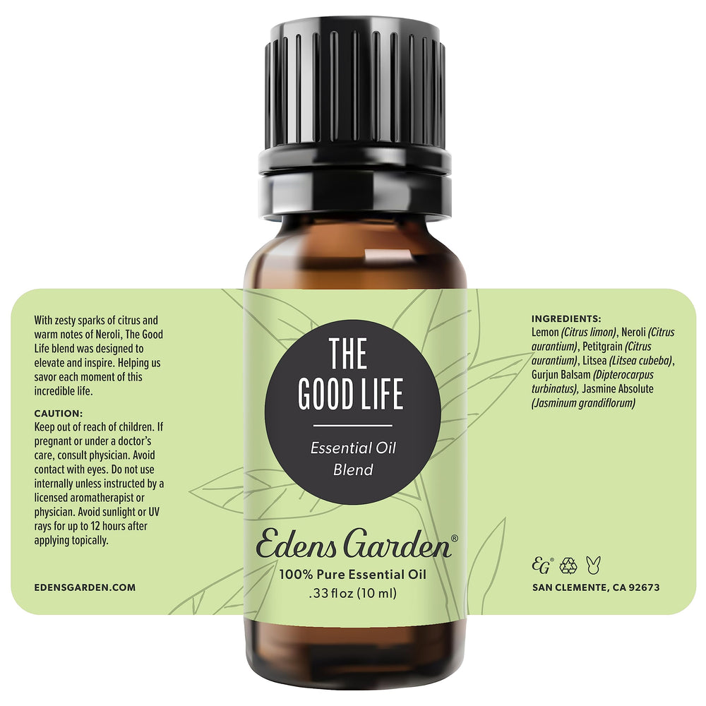 10 ml bottle of The Good Life essential oil blend resting on natural surface