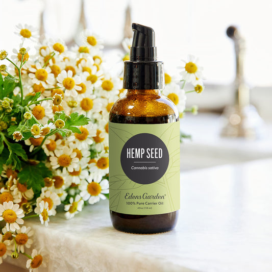 Close-up of Edens Garden hemp seed carrier oil bottle
