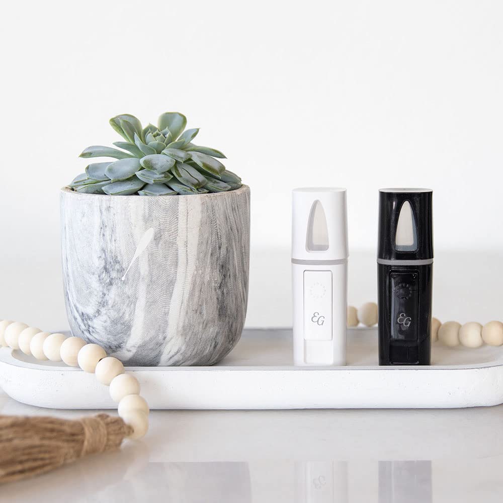 Edens Garden Mio Mist diffuser in black with travel case for car or commute aromatherapy.