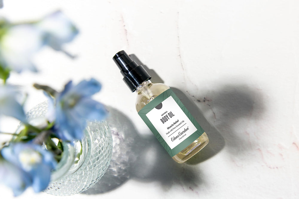 Massage application of muscle relief oil on shoulder