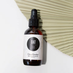 Oat carrier oil bottle with label close-up