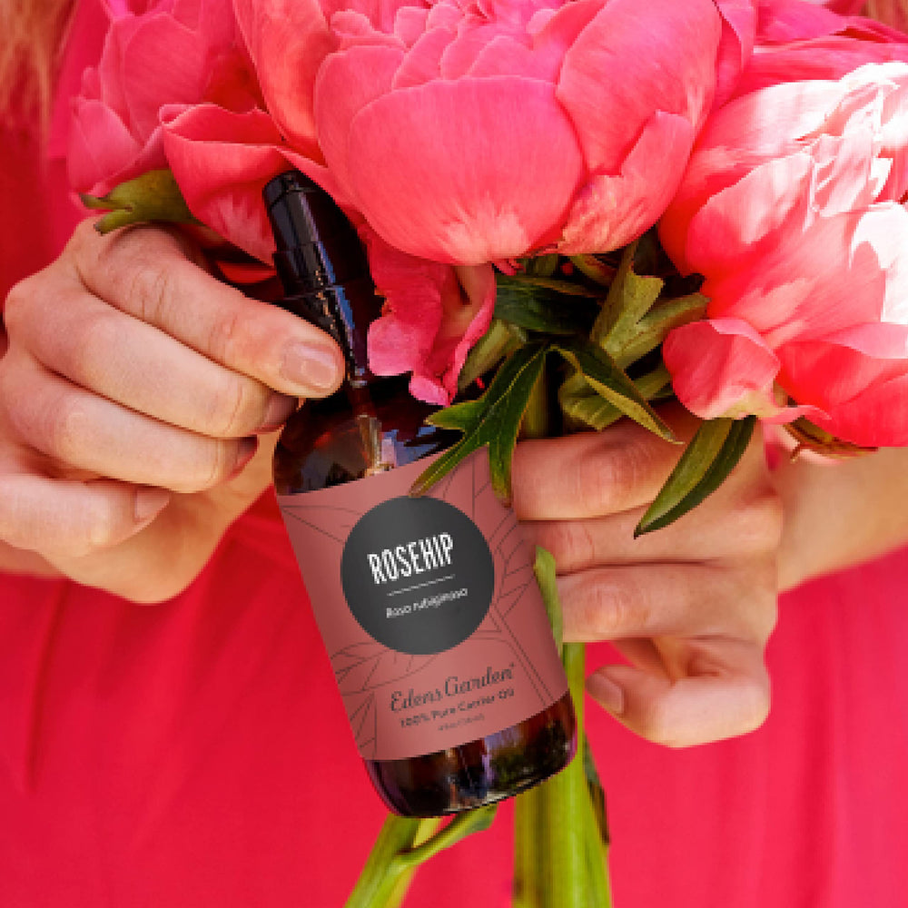Amber glass bottle of Edens Garden Rosehip Oil