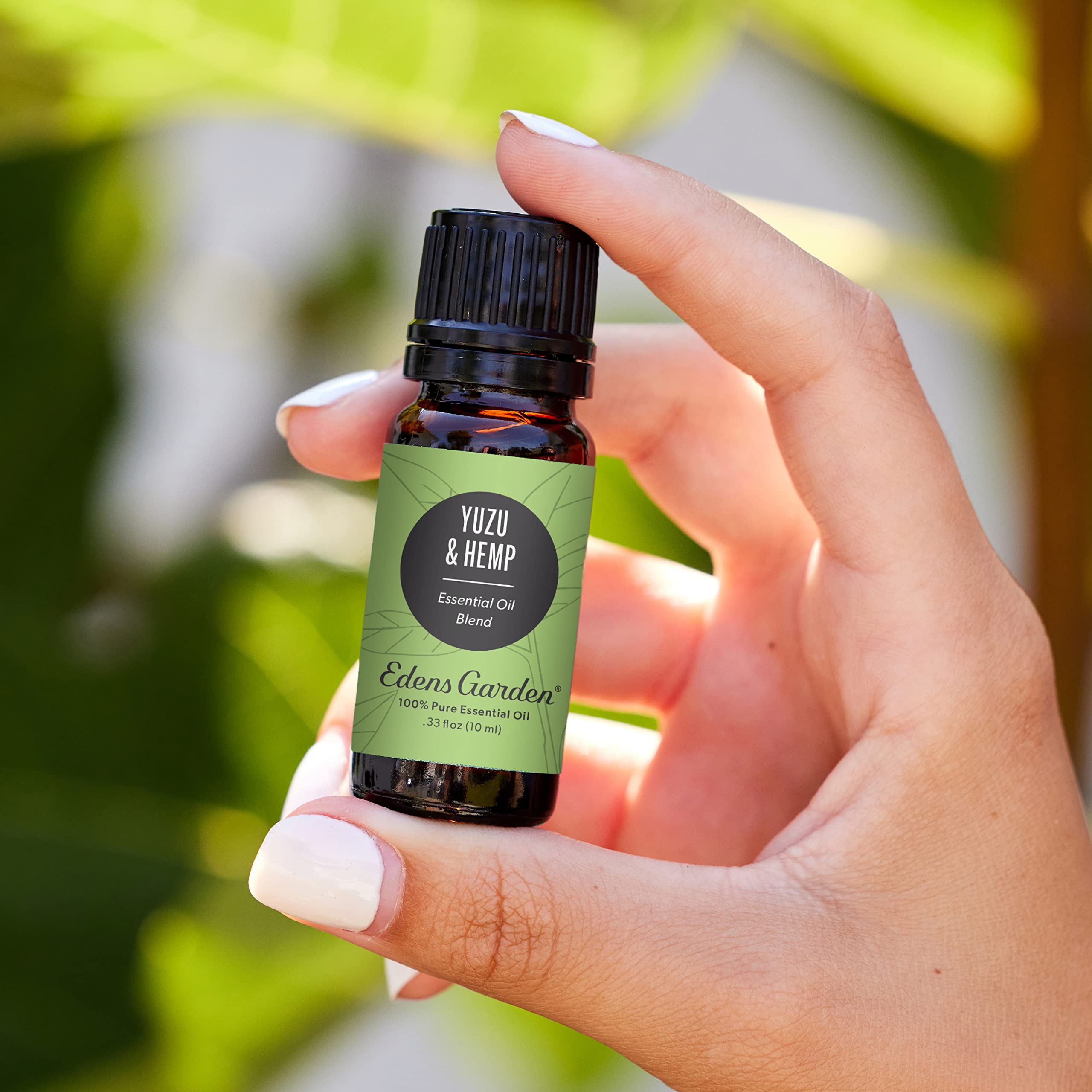 Close-up of Yuzu & Hemp essential oil blend bottle