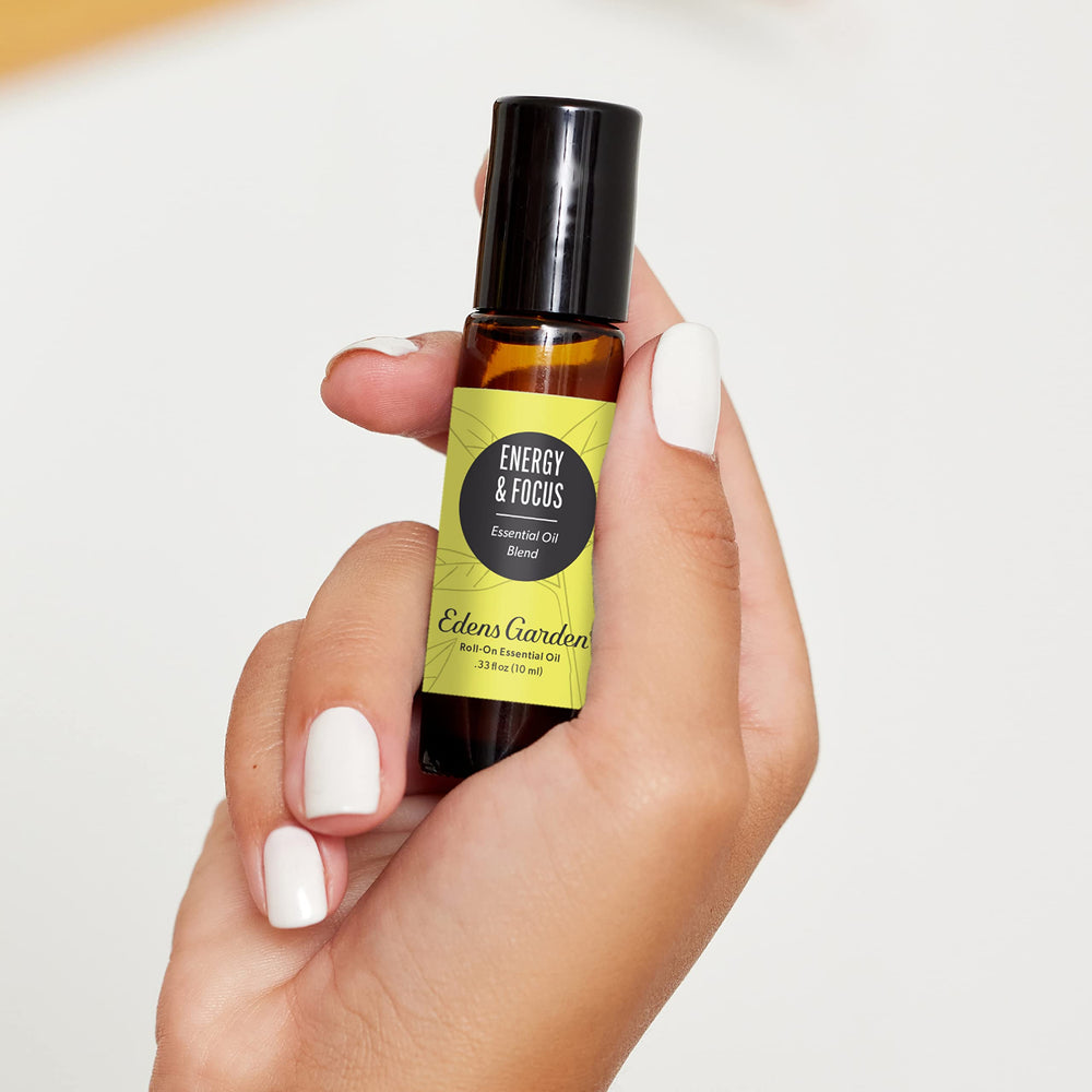 Close-up of the label showing 100% pure essential oil and premium grade