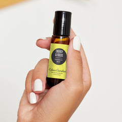 Close-up of the label showing 100% pure essential oil and premium grade