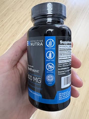 Effective Nutra Dim 300mg bottle on wood table for home-use routine.