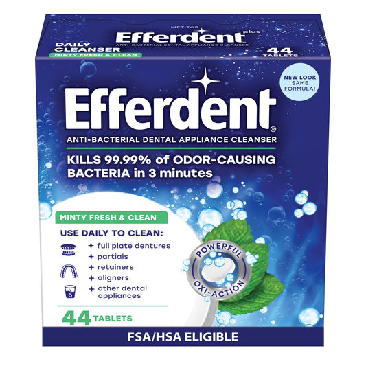 Efferdent Minty Fresh & Clean denture cleaner tablet dissolving in water