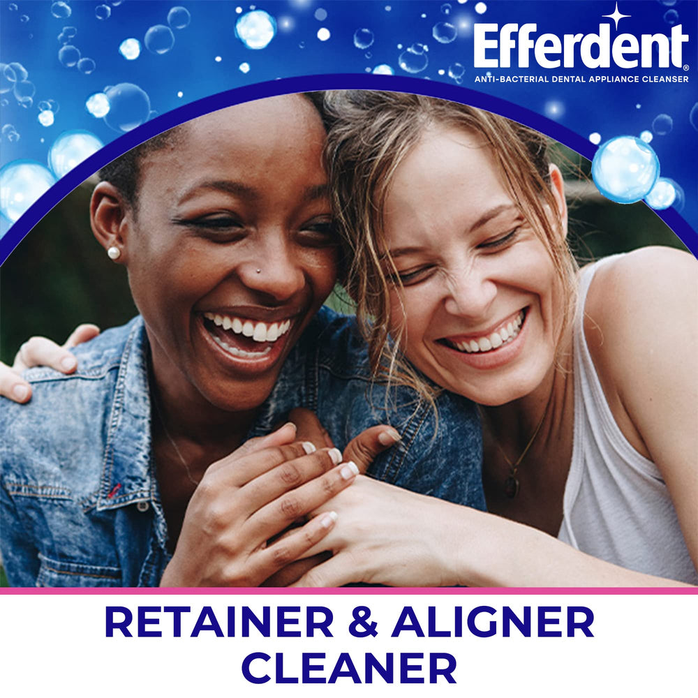 Retainer and dentures being cleaned with Efferdent Complete Clean