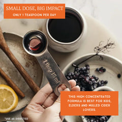 Measuring spoon with elderberry syrup for dosing