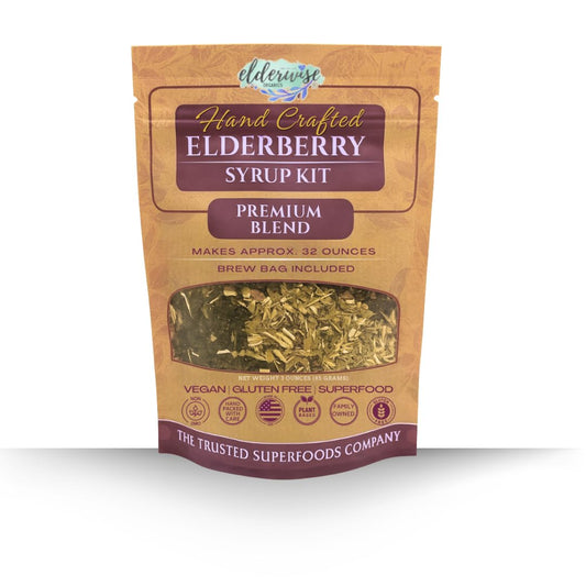 Ingredients laid out for Elderwise Organic Elderberry Syrup Kit: elderberries, rosehips, ginger, echinacea, cinnamon, cloves