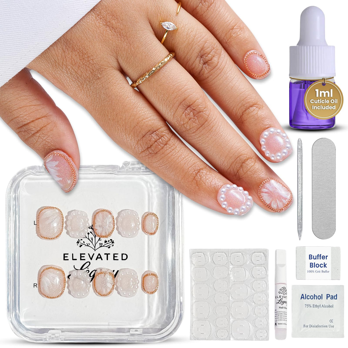 ELEVATED LÉGACY Large-Pearl Royale French Tip nails show a salon-style finish for at-home wear.