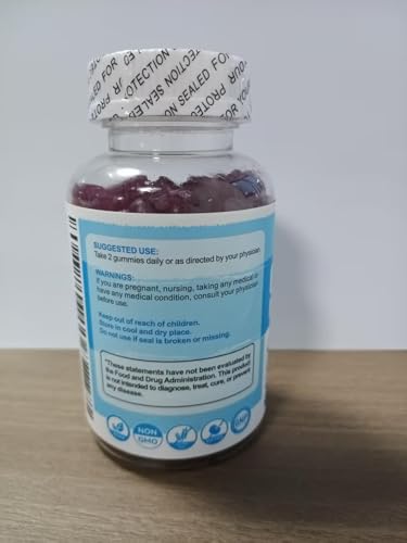 Blueberry flavored gummies spilling from bottle