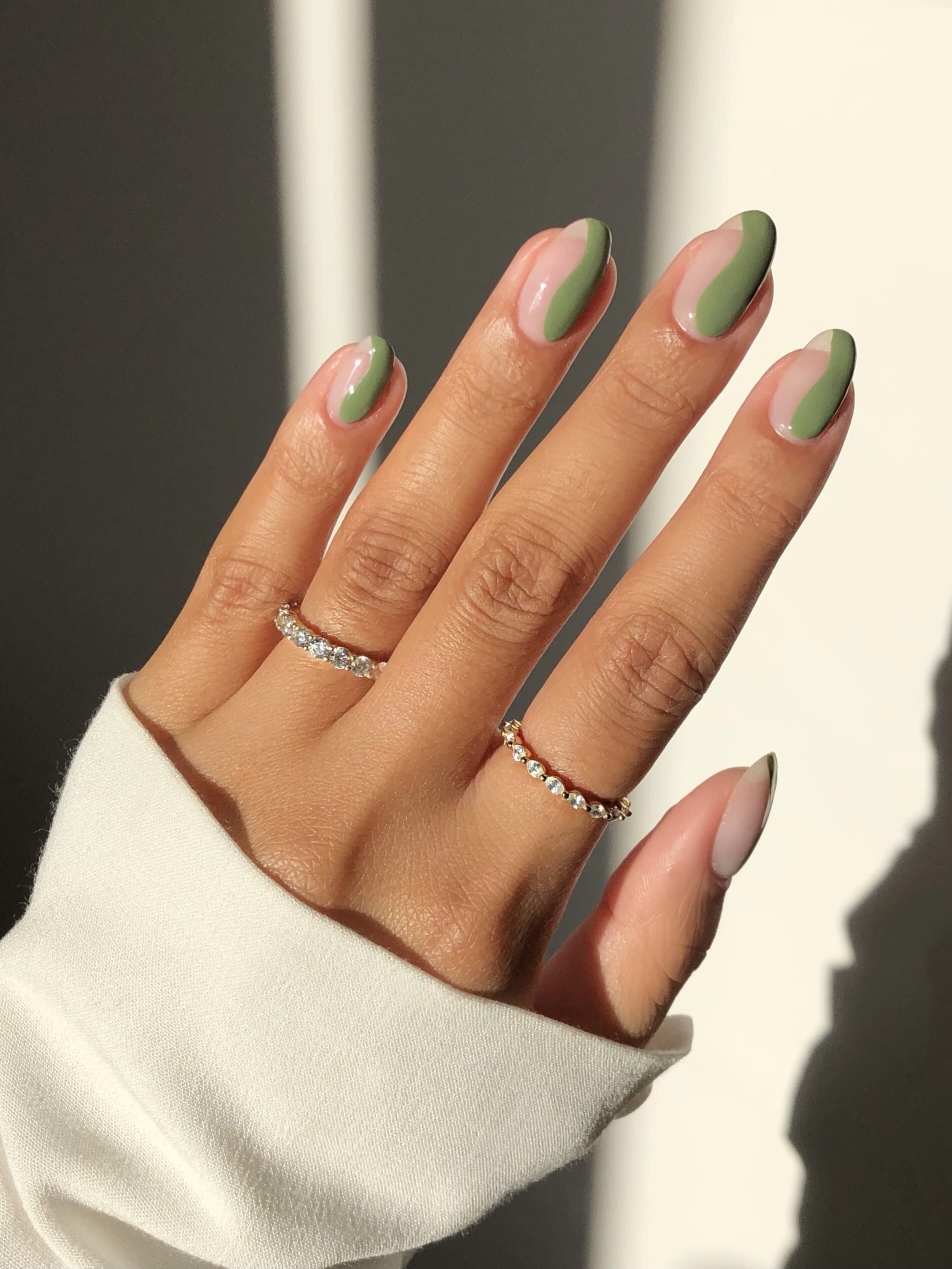 ella+mila fast-dry top coat drying in under three minutes for time-saving manicures.