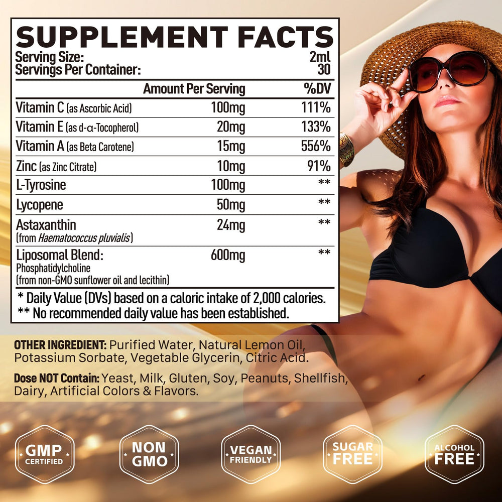 Glass with poured Elysx liposomal tanning drops