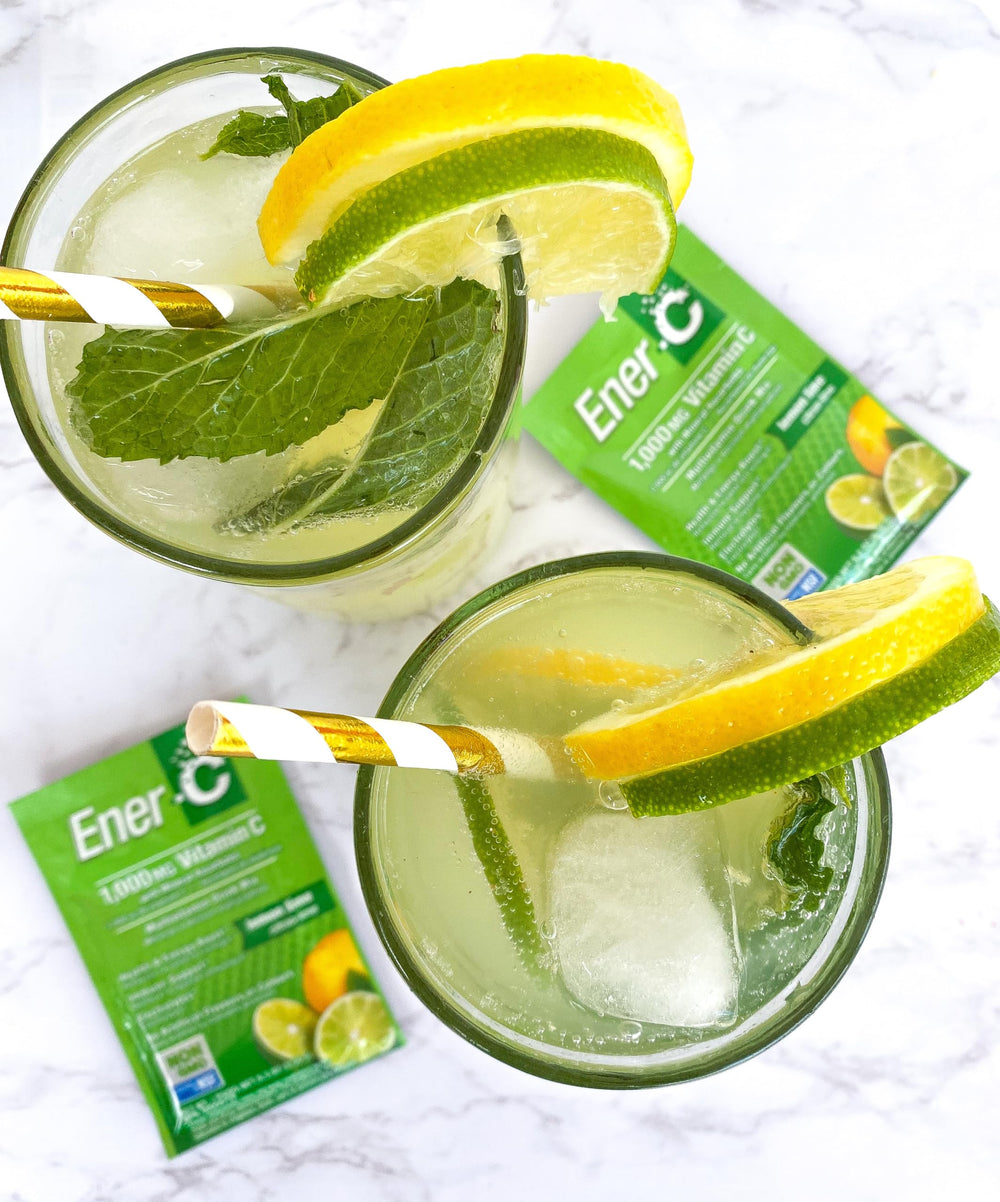 Dissolved Ener-C drink mix in a glass showcasing lemon lime flavor