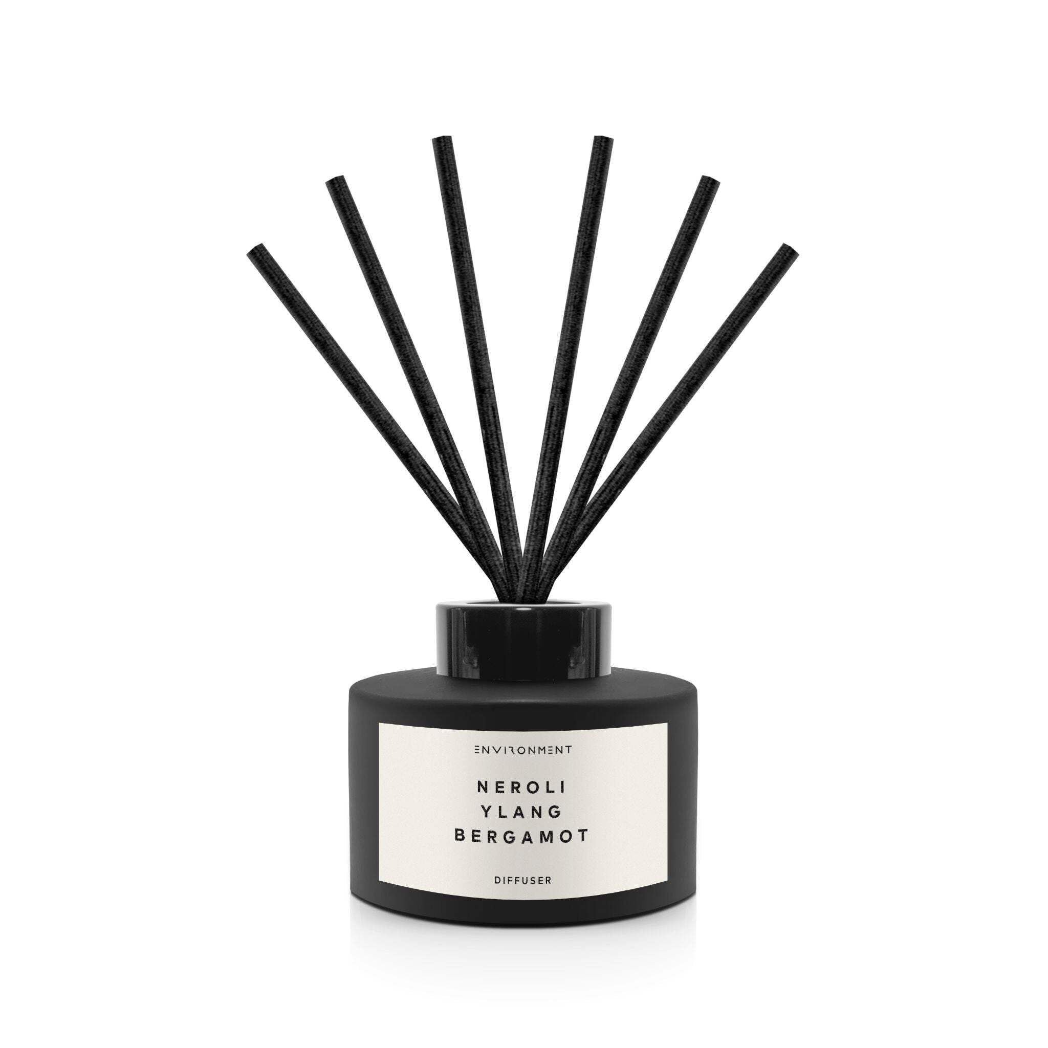 Environment CN5 Neroli-Ylang-Bergamot diffuser bottle with reeds for continuous fragrance.