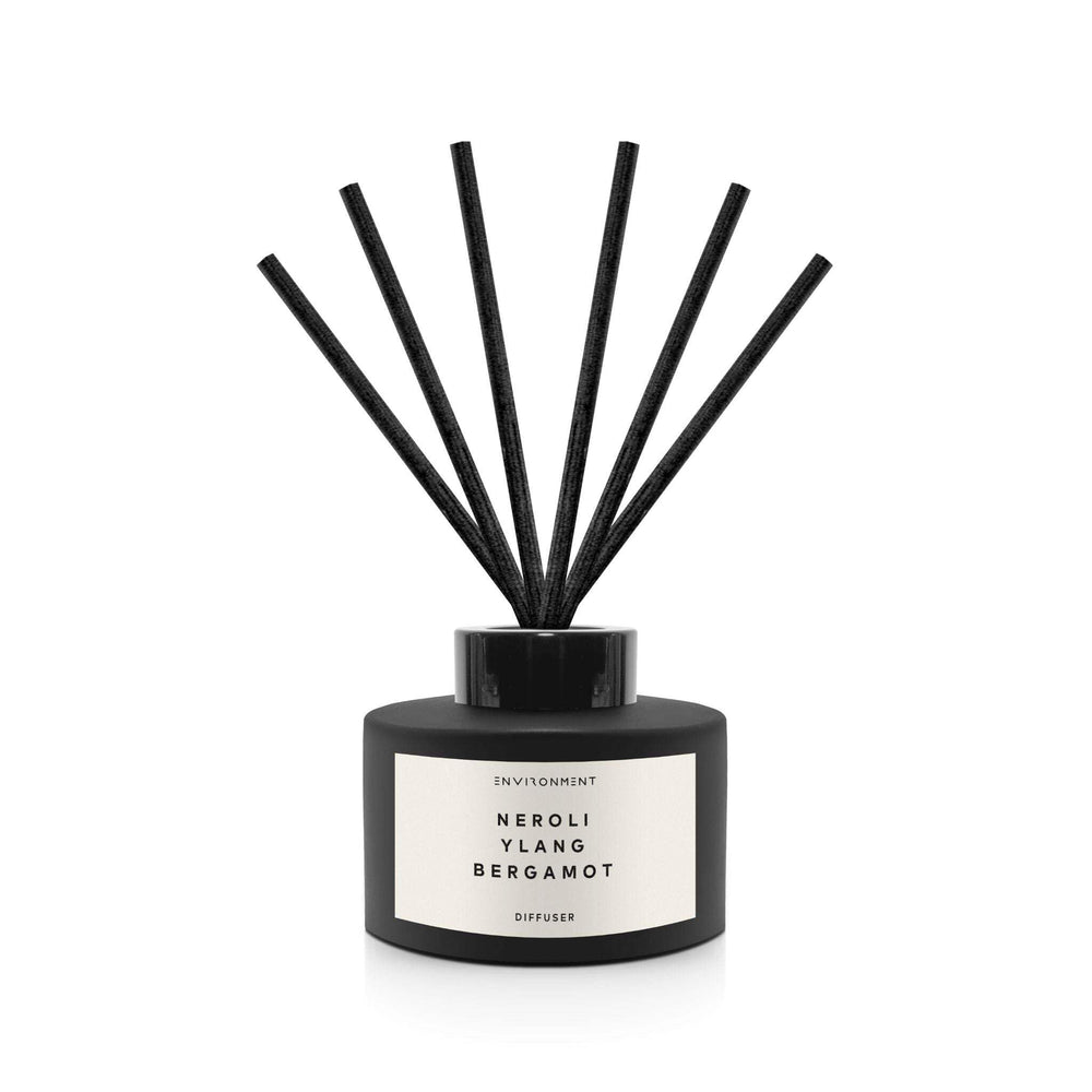 Environment CN5 Neroli-Ylang-Bergamot diffuser bottle with reeds for continuous fragrance.