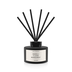 Environment CN5 Neroli-Ylang-Bergamot diffuser bottle with reeds for continuous fragrance.