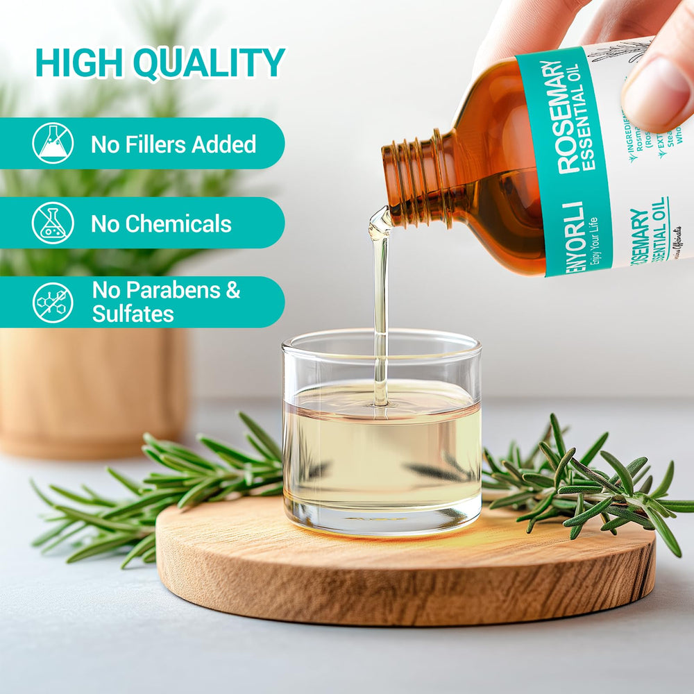Close-up of dropper releasing rosemary essential oil