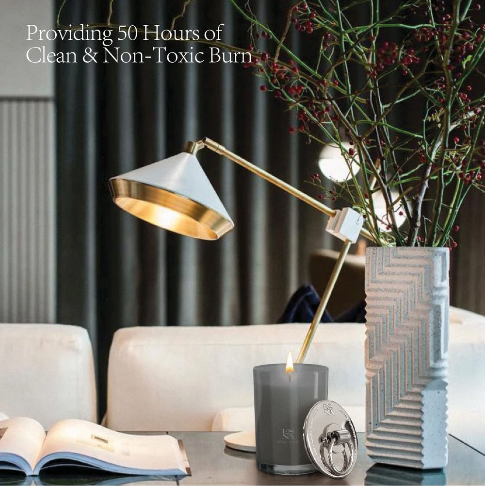 ESNA HOME luxury candle with holiday decor for seasonal charm.