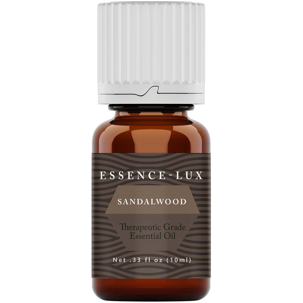 Amber glass bottle containing Essence-Lux Sandalwood Essential Oil (10ml)