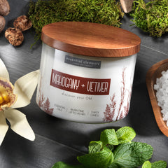 Essential Elements game night candle creating warm, inviting atmosphere.
