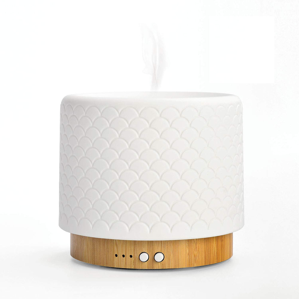 Essential oil diffuser 280ml on wooden table